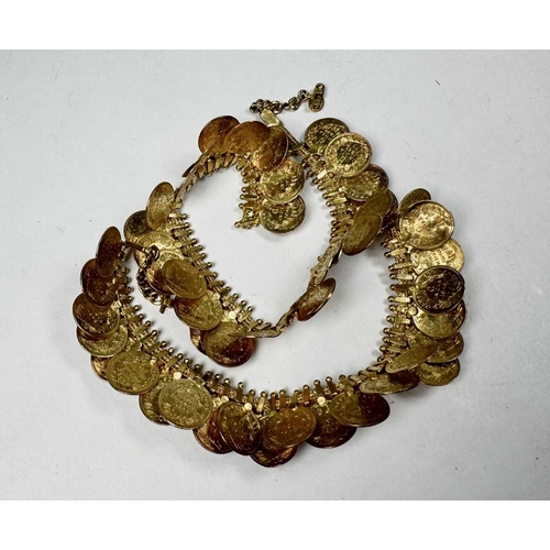 663 - An Indian yellow metal coin necklace, 42g