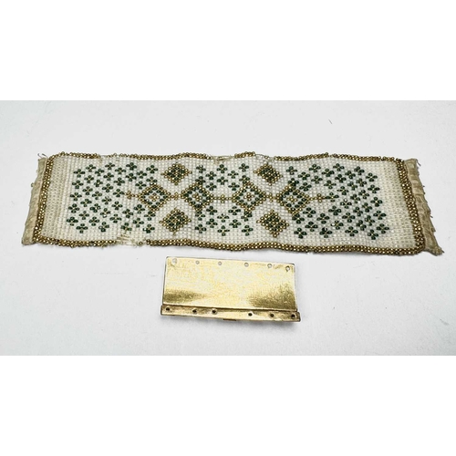 665 - A late Georgian embroidered beadery bracelet, with yellow metal clasp, length of embroidery 13.2cm, ... 