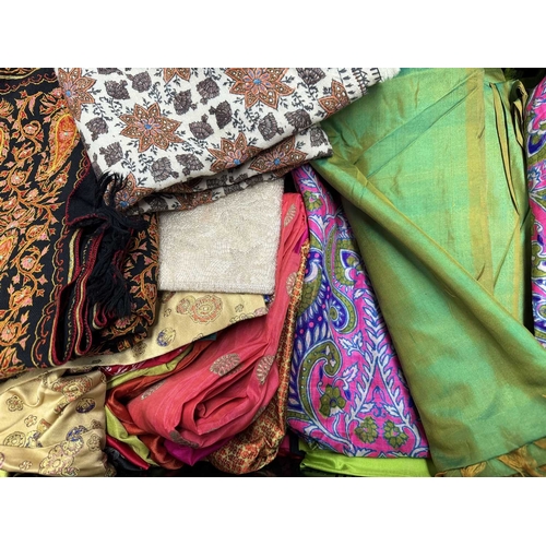 67 - A large selection of sarees and fabrics