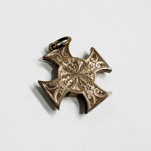 672 - A late Victorian yellow metal engraved Maltese cross pendant, with sardonyx locket reverse, length 3... 