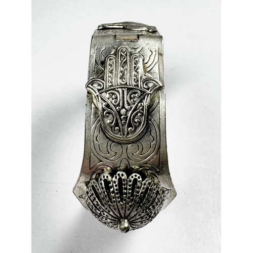 673 - An early 20th century silver camel and hamsa bangle bracelet, inner diameter 6cm, 51.7g