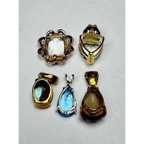 677 - Five gem-set pendants, gems to include blue topaz, labradorite, smoky quartz and prasiolite, four wi... 