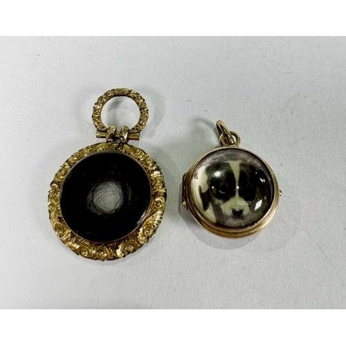 679 - Two 19th century yellow metal lockets, one with rock crystal faces, length 2.6 to 3.3cm, total weigh... 