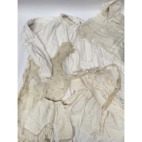 69 - A collection of lace, linen and damask, 19th-20th century, also including baby/dolls clothing, chris... 