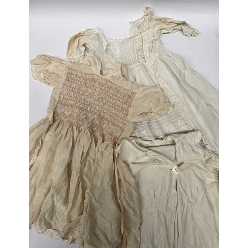 69 - A collection of lace, linen and damask, 19th-20th century, also including baby/dolls clothing, chris... 