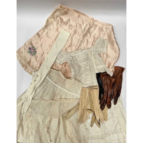 69 - A collection of lace, linen and damask, 19th-20th century, also including baby/dolls clothing, chris... 