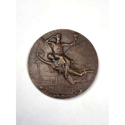 711 - A 1900 bronze Paris Exposition Universelle Internationale medal, designed by J. C. Chaplain, depicti... 