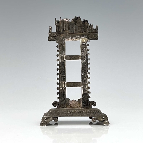 728 - A William IV silver 'castle top' desk thermometer stand, the upright rectangular frame with dual bra... 