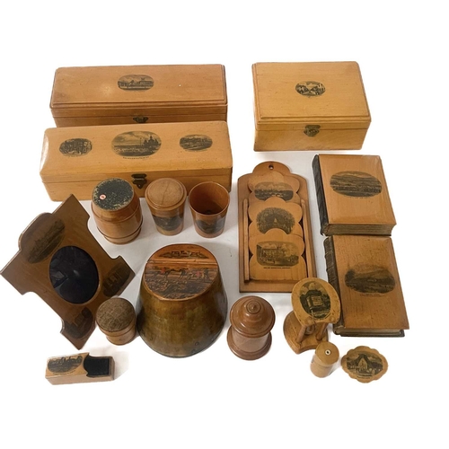 76 - A large collection of Mauchline ware including boxes, books and accessories, various transfer printe... 