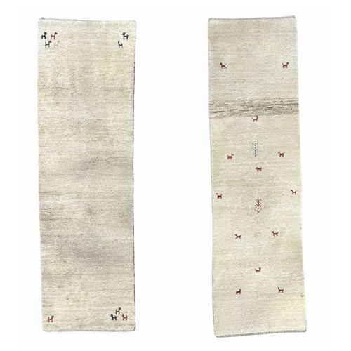 764 - Two Gabbeh wool runner rugs, cream with animal motifs, 271 by 84cm and 289 by 83cm (2)