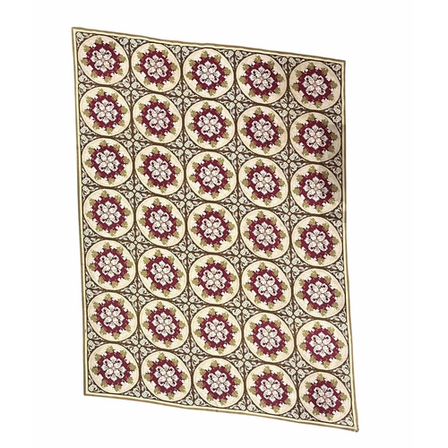 768 - A large needlework panel or rug, olive green ground with repeated cream and red roundels decorated w... 