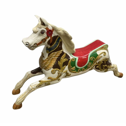 775 - A carved and painted fairground horse, inscribed Woody's first galloper Aug 1987, modelled in full g... 