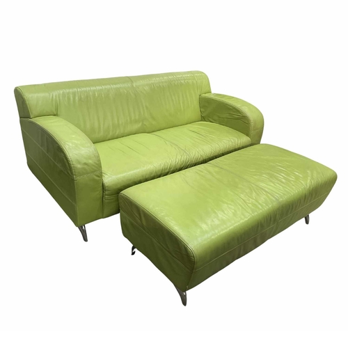 786 - A lime green leather upholstered two seated sofa and foot stool, circa 2000, with aluminium horn sha... 