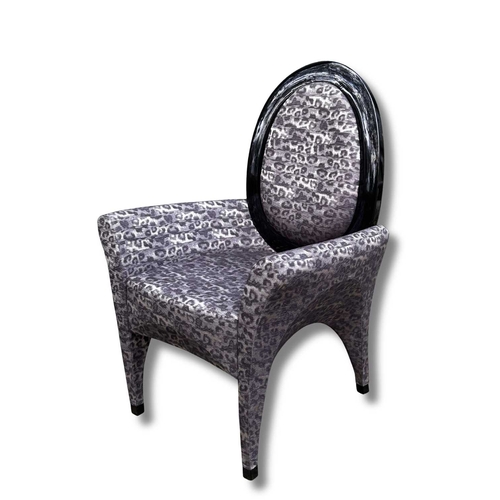 788 - Fendi Casa, a dark leopard print upholstered armchair, the oval black with a black high-gloss frame,... 