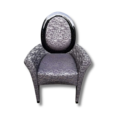 788 - Fendi Casa, a dark leopard print upholstered armchair, the oval black with a black high-gloss frame,... 