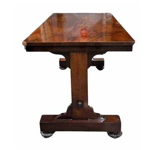 802 - 19th century flame mahogany library table with turned wood stretcher, on raised feet and castors, 12... 