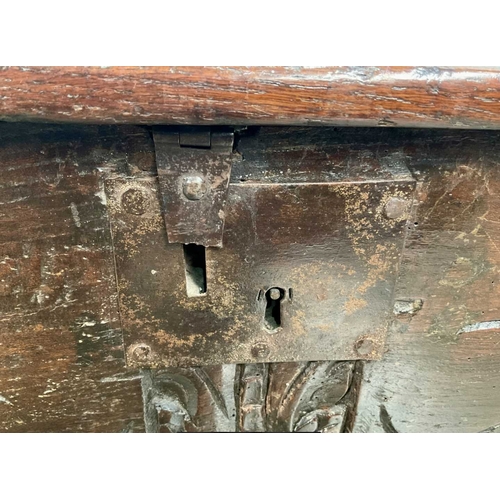 803 - A provincial Jacobean-style oak chest, possibly 17th or 18th century, plane moulded top opening to v... 