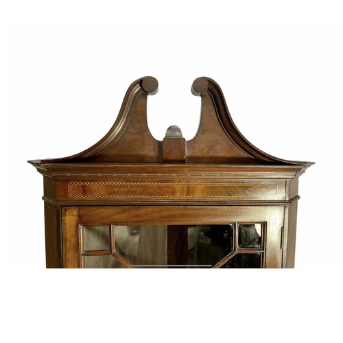 806 - An Edwardian glazed display cabinet, broken swan neck pediment above traditional moulded cornice, fr... 