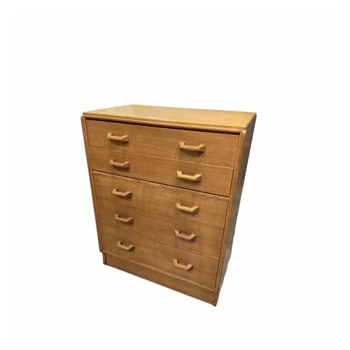 808 - An oak G-Plan tallboy chest of drawers, mid-century, five drawers of graduated sizes (short on top t... 