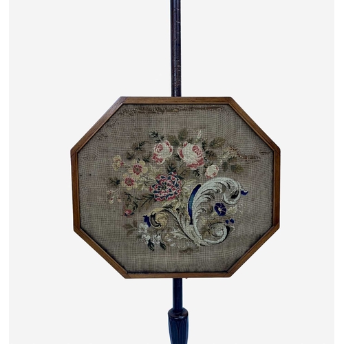 812A - A 19th century mahogany tripod pole screen with embroidered floral panel, height 143cm, widest point... 