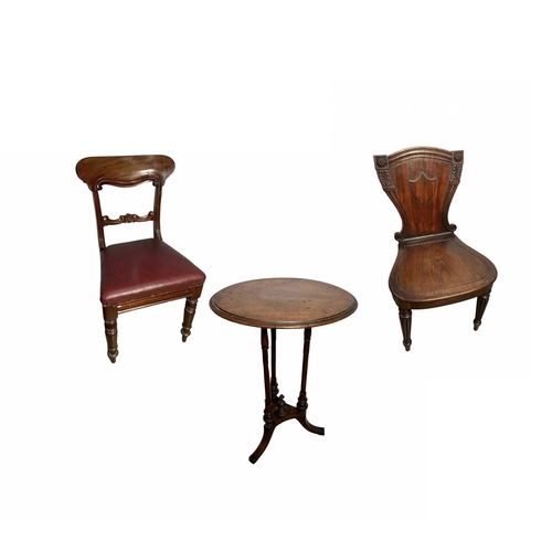 840 - A 19th century mahogany hall chair, scrolled shield back with central cartouche, bordered by stylise... 