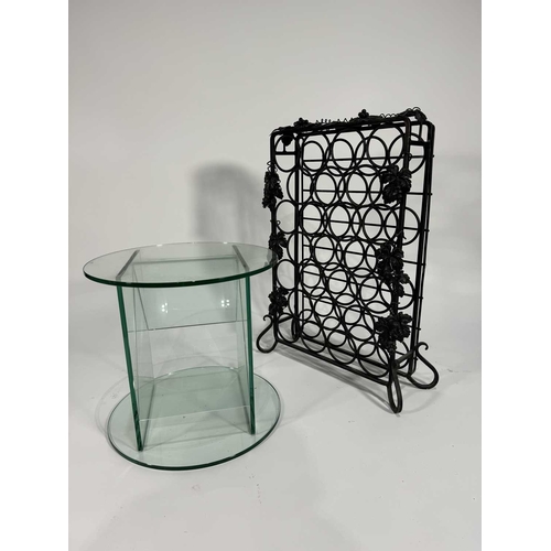 848 - A Greenapple Co. glass contemporary circular table, sloped glass panels forming the magazine rack, 4... 