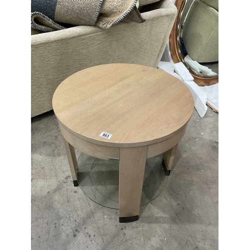 863 - A Brigitte Forestier 'Grandeur de Nature' round table in light oak with a central glass shelf, 61cm ... 