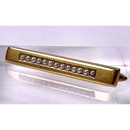 579 - An Edwardian gold seed pearl bar brooch, length 3.9cm, 3.3g