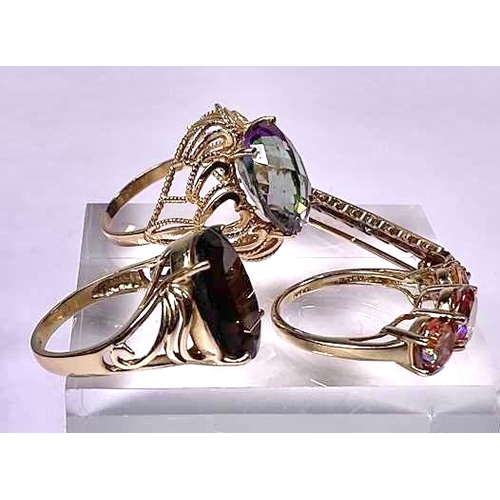 601 - Three gem-set rings, together with a 9ct gold sapphire and diamond brooch, two rings stamped 10k, on... 