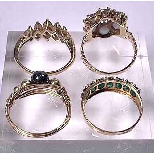 618 - Three gold coloured metal gem-set rings, together with a gold coloured metal hematite bead accent dr... 