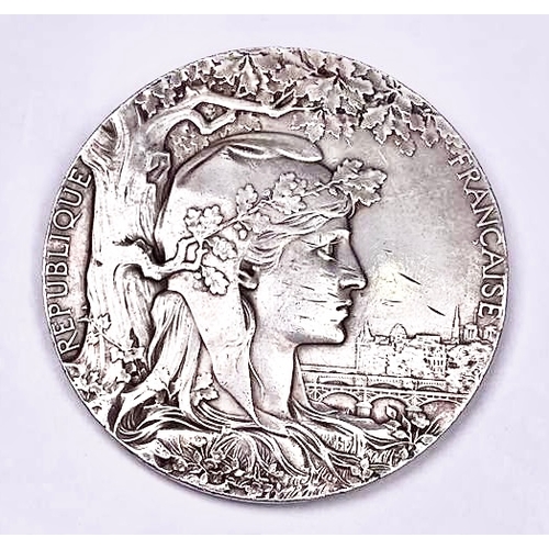 698 - A 1900 silver-coloured metal Paris Exposition Universelle Internationale medal, designed by J. C. Ch... 