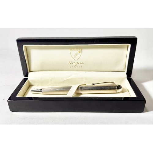 717 - An Aspinal of London hallmarked silver ballpoint pen, boxed