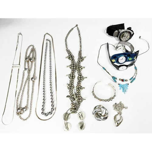 733 - A selection of silver and white metal jewellery, together with four various watches