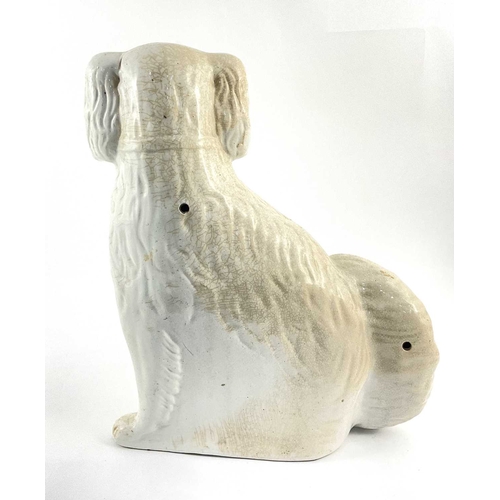 101 - Beswick: a pair of Staffordshire white spaniels 