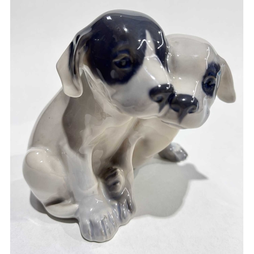 116 - Royal Copenhagen figure group of black and white glazed puppies, marks, painted and incised number '... 