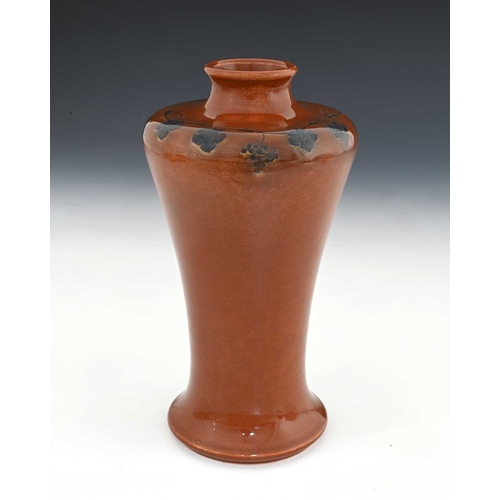 125 - Ruskin Pottery, a Vine painted Souffle glazed vase, circa 1905, Meiping form, brown with blue grape ... 