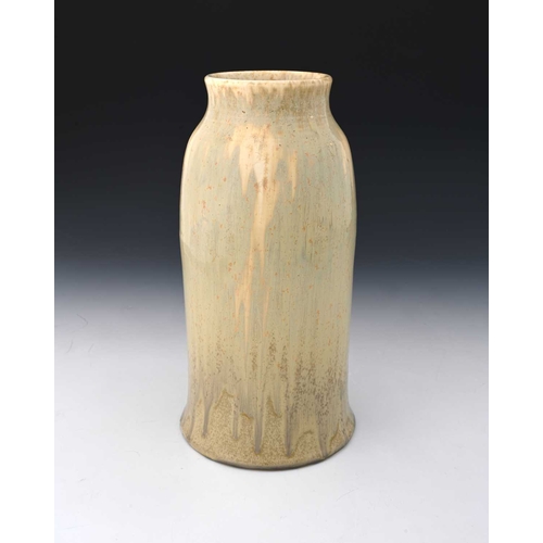 128 - Ruskin Pottery, a Crystalline vase, circa 1930, conical bell form, streaky taupe glaze, impressed ma... 