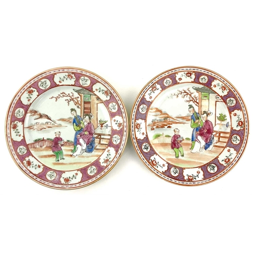 140 - A pair of Chinese export Mandarin pattern plates, Qianlong, 18th century, depicting a child reading ... 