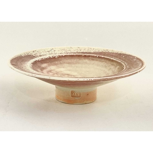 149 - A small footed Mary Rich studio ceramic dish in a spotted pink finish, 14cm across, 4cm high (1)