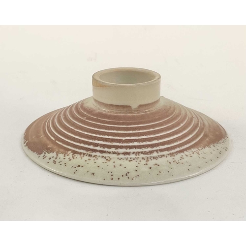 149 - A small footed Mary Rich studio ceramic dish in a spotted pink finish, 14cm across, 4cm high (1)