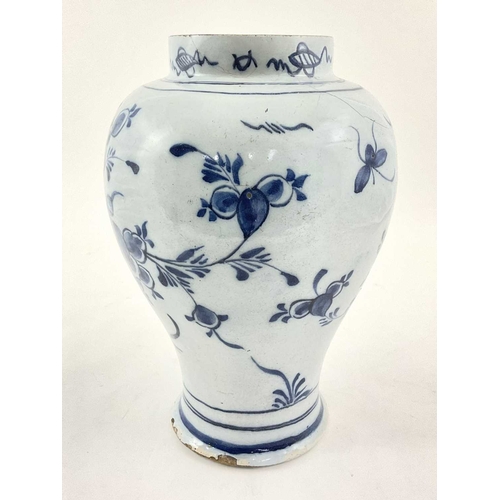 163 - A Dutch Delft baluster vase, 18th century, decorated in underglaze blue with a motif of a bird among... 