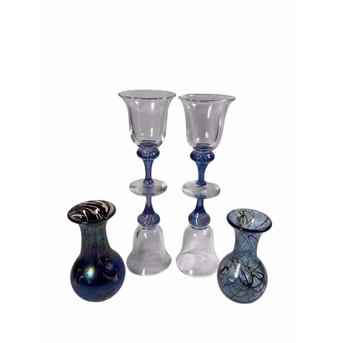 175 - Adrian Sankey studio glass including a set of four wine glasses, two iridescent vases of baluster fo... 