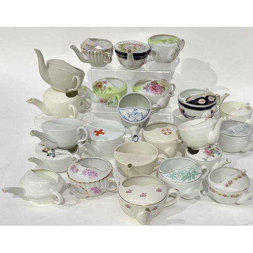 21 - A large collection of invalid/child feeding cups, including early 20th century examples from the Bri... 