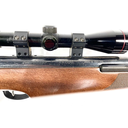 221 - An Air Arms TX200 HC (Hunter carbine) air rifle, .22 Cal., beech stock, Simmons scope 3-9X40mm, Made... 