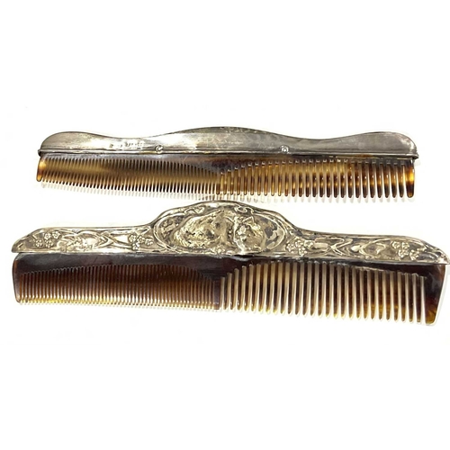 23 - A faux tortoise shell comb with cat motif on silver handle and another, with a collection of perfume... 