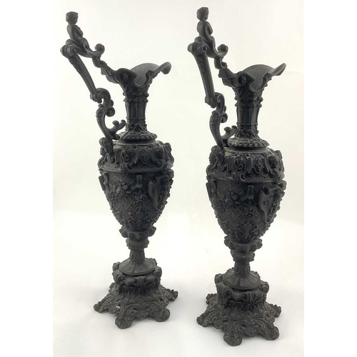 230 - A pair of late 19th century French LSF foundry cast metal ewer forms, with highly ornate Renaissance... 