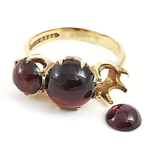 263 - A 9ct gold garnet cabochon three-stone ring, at fault, one garnet currently loose from mount, ring s... 