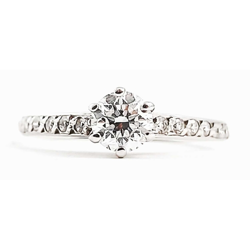 268 - A 9ct gold diamond brilliant-cut diamond single-stone ring, with similarly-cut diamond line shoulder... 