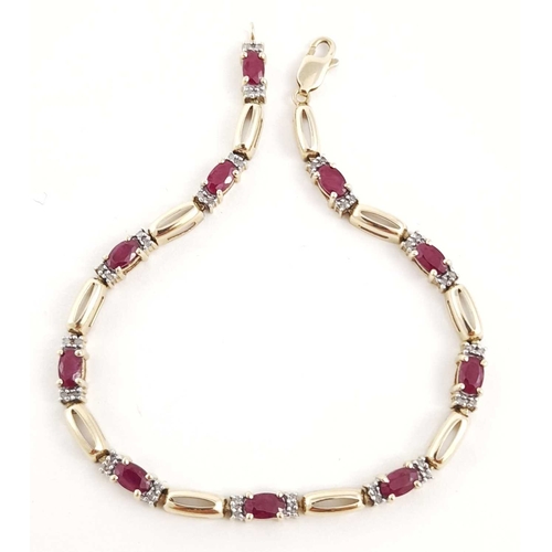 291 - A 9ct gold ruby and diamond bracelet, with lobster clasp, total diamond weight 0.20ct stamped to mou... 