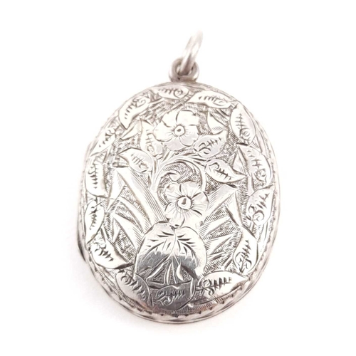 297 - A late Victorian silver engraved locket pendant, hallmark for Birmingham 1884, length 4cm, 11g